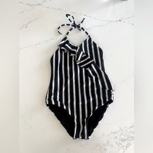 Tori praver bathing suit, size L runs smaller like (m)